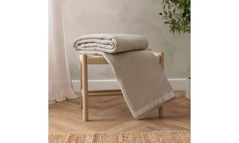 Versatile blankets and throws made for layering, lounging, and relaxed moments at home.