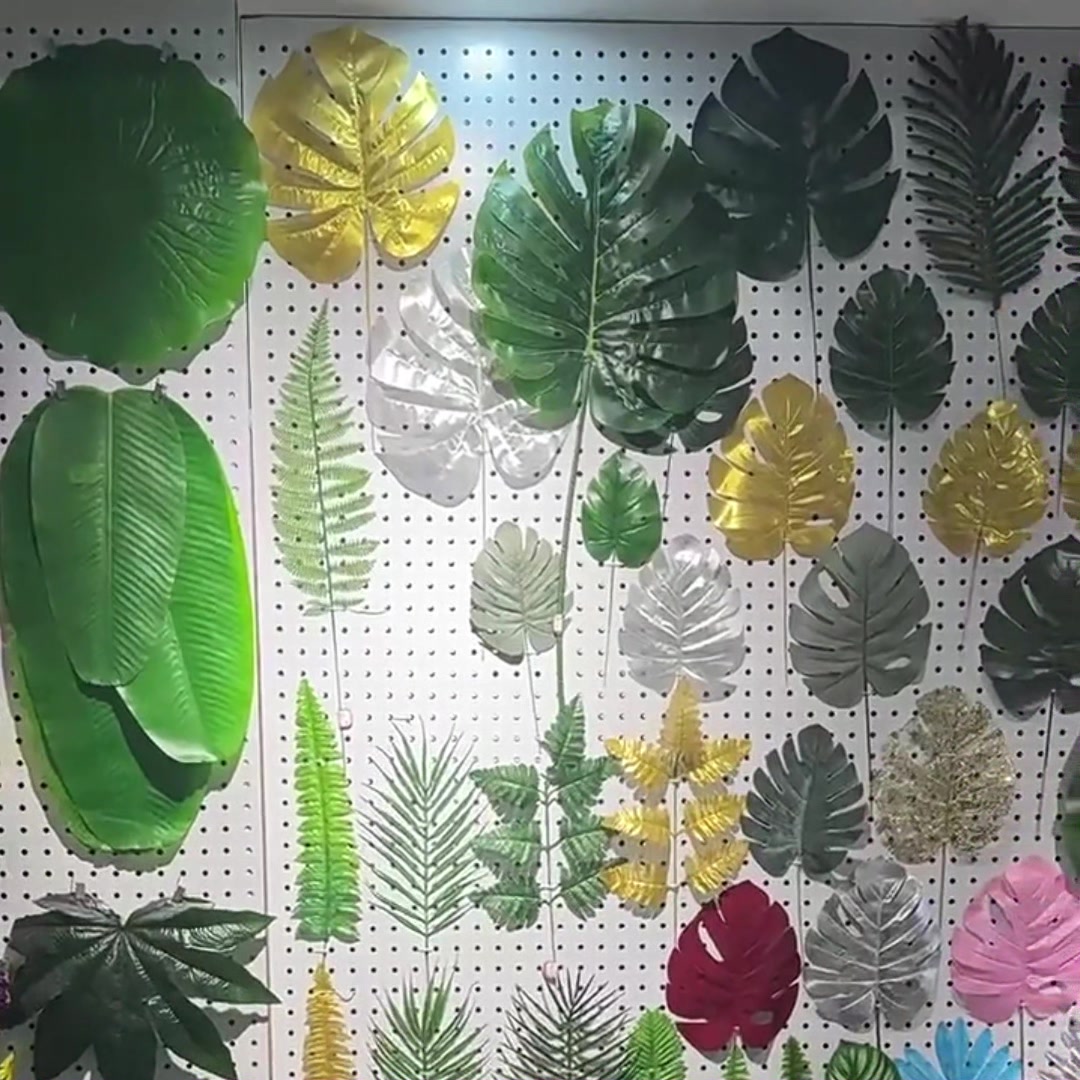 66pcs 15.3in/38.8cm
Artificial Palm Leaves Tropical Fake Leaves, Monstera Leaf Gold and Green Faux Leaves for Safari Jungle Hawaiian Dinosaur Luau Party Table Decoration image 0