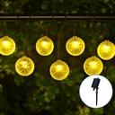 Aigostar SunGlow S10: guirlande lumineuse solaire, 10-LED, lumière chaude, IP44, batterie Ni-MH, motif citron image 1